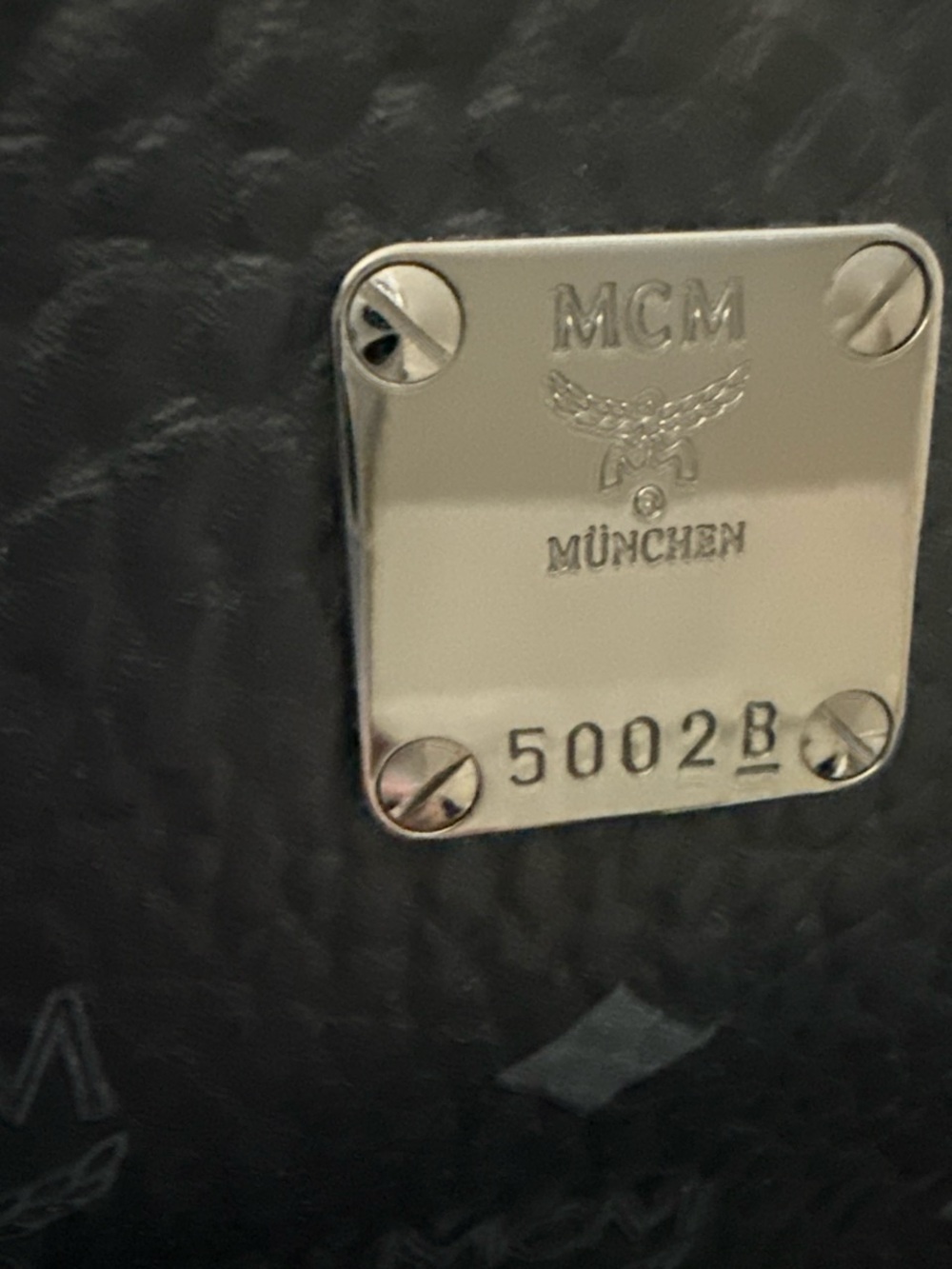MCM Black Logo-Print Leather Backpack with Stud Accents - Picture 6 of 8